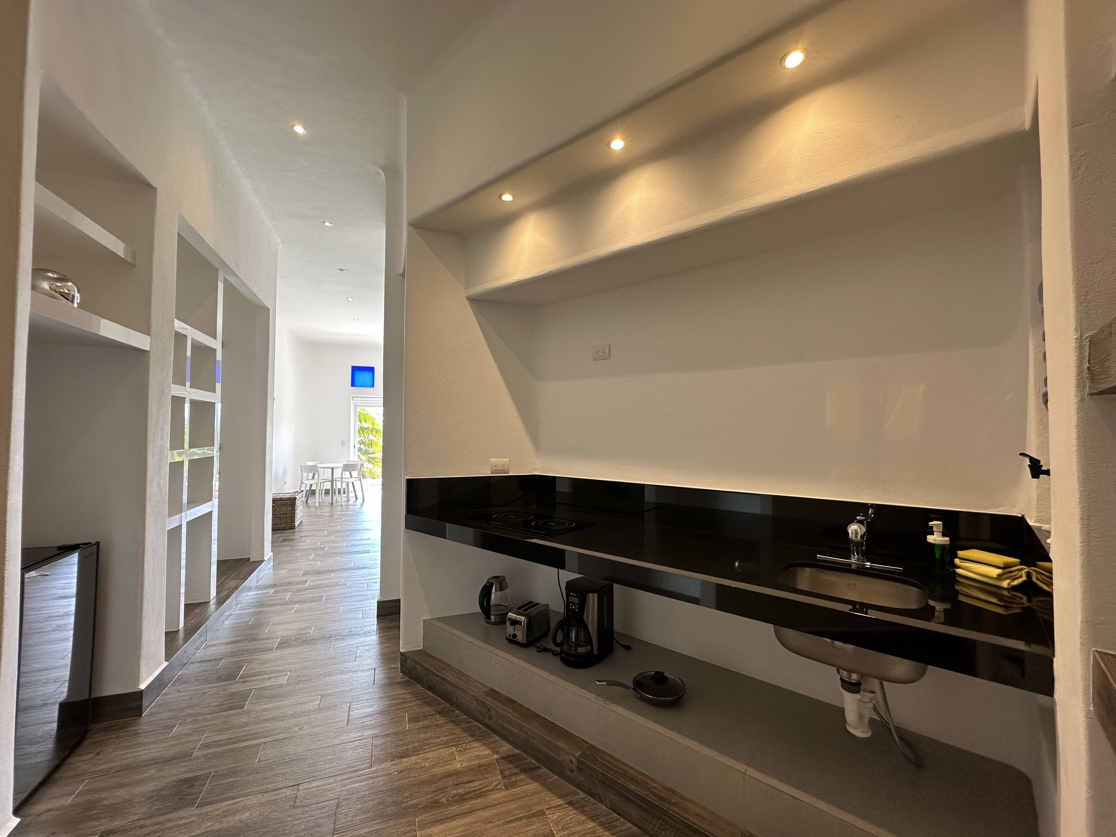 junior suite, 1 king bed, lagoon view | 1 bedroom, in-room safe, desk, laptop workspace