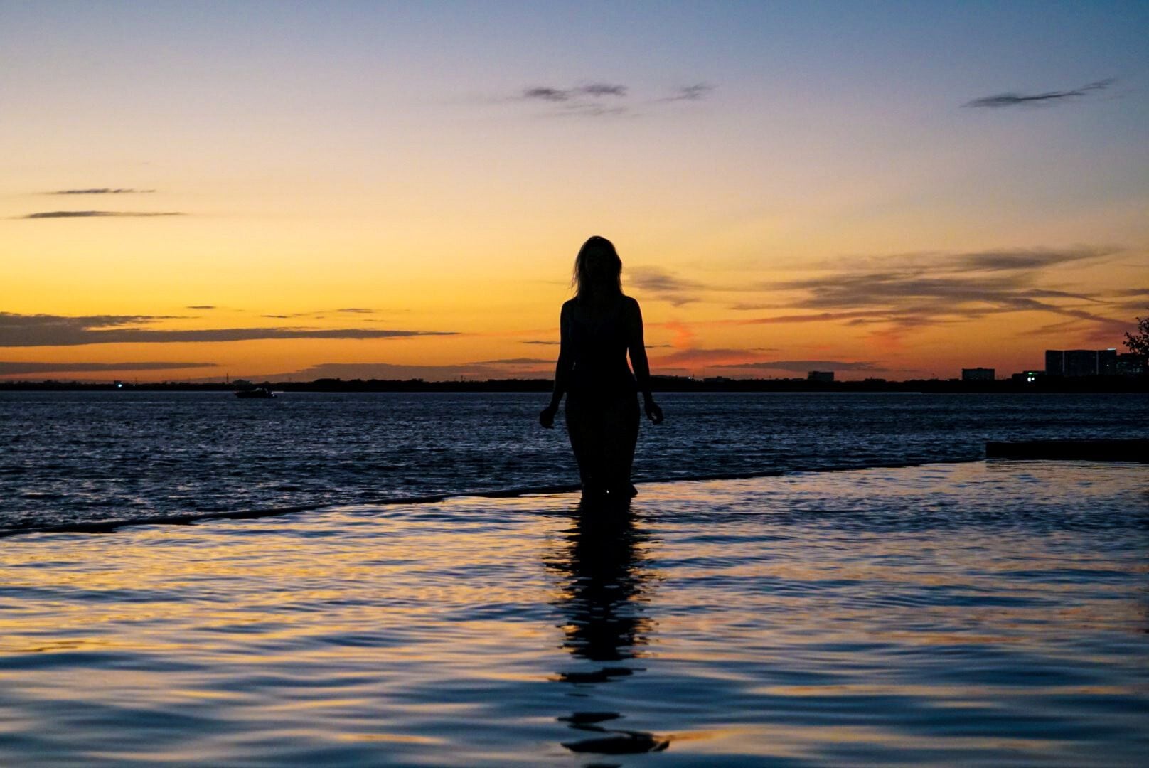 outdoor pool, open 7:00 am to 10:00 pm, pool umbrellas, pool loungers