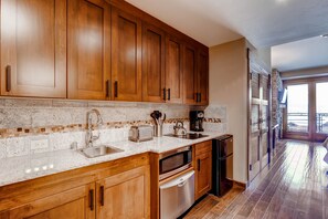 Microwave, stovetop, dishwasher, coffee/tea maker