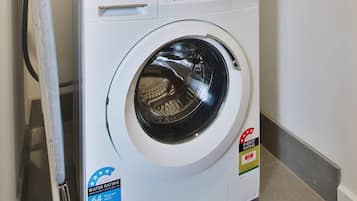 Desk, laptop workspace, blackout drapes, soundproofing