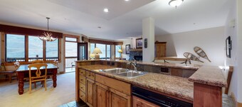 Ski-in/ski-out condo w/ fireplace, W/D, balcony & shared slopeside pool/hot tub