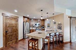 Fridge, microwave, oven, stovetop - Impressive & lavish condo w/ bonus den, gas fireplace, & shared pool & hot tubs (Steamboat Springs)