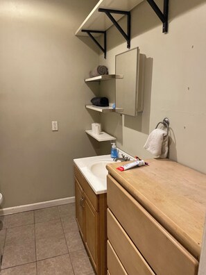 Hair dryer, towels, soap, toilet paper