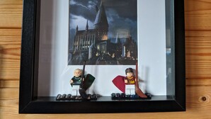 A framed picture of a castle with two LEGO figures in front. - Private Harry Potter themed lodge with lovely views (Arisaig)