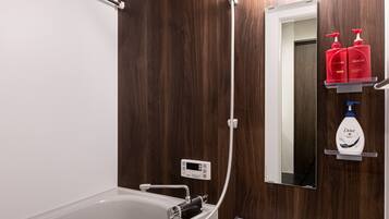 Standard Apartment | Bathroom | Separate bathtub and shower, deep-soaking bathtub, free toiletries