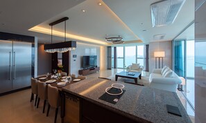 Beach Special Suite D | Living area | Flat-screen TV, heated floors