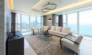 Ocean Around Suite I, J (Mipo Harbor View) | Living area | Flat-screen TV, heated floors