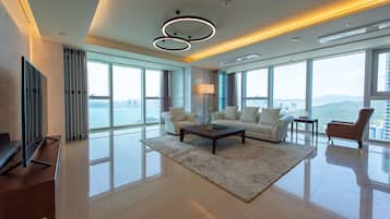 Beach Special Suite D | Living area | Flat-screen TV, heated floors