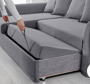 Relax on the extendable sofa with hidden storage.