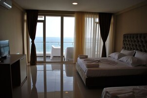 Family Room, Sea View | Minibar, in-room safe, desk, soundproofing