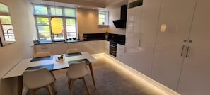 Apartment | Private kitchen | Full-size fridge, oven, stovetop, dishwasher