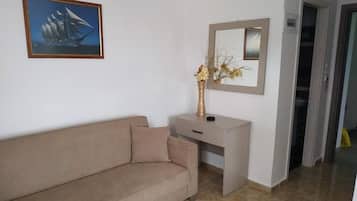 Standard Triple Room, Pool View | Living area | 32-inch plasma TV with satellite channels, TV