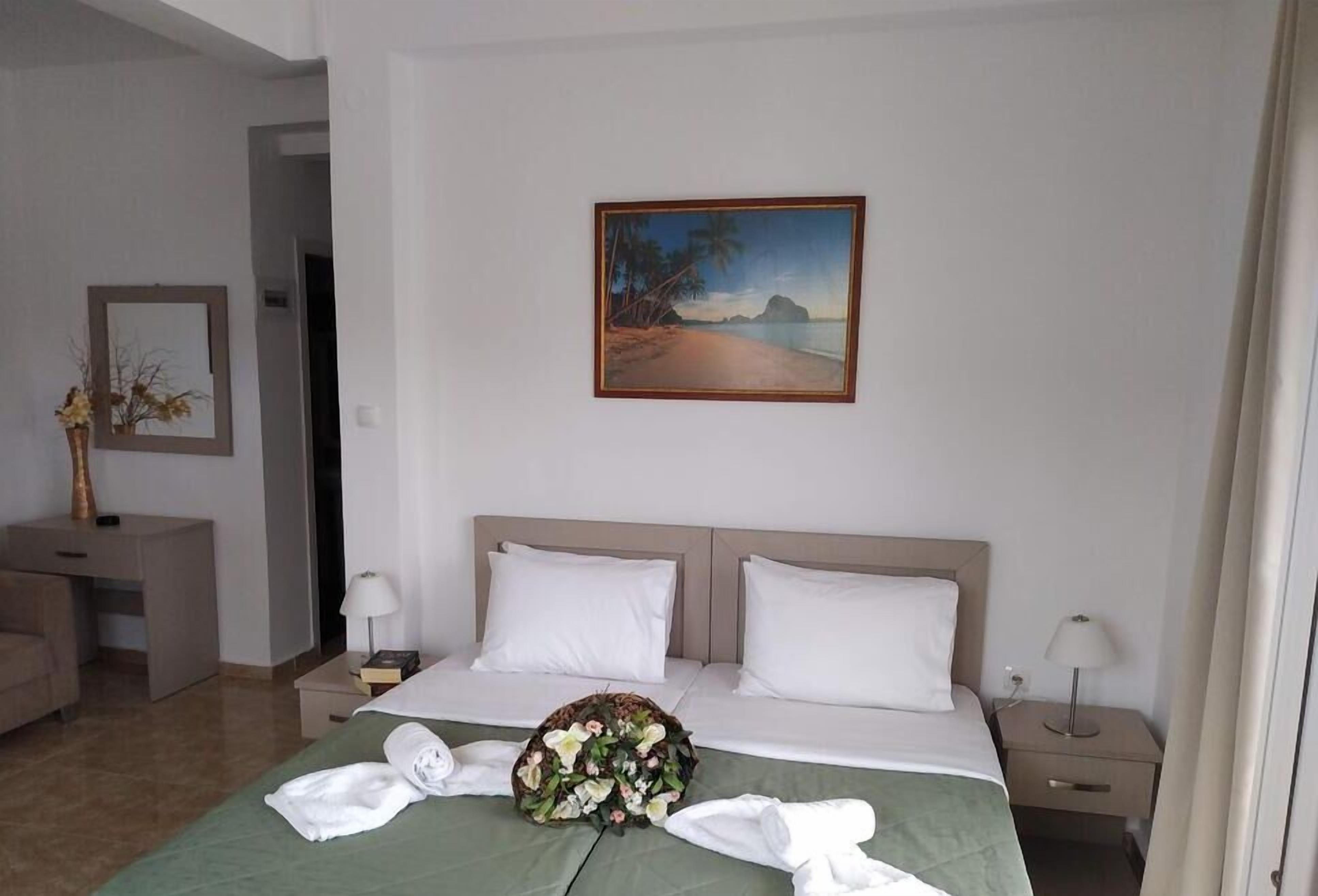 Standard Triple Room, Pool View | In-room safe, soundproofing, free cribs/infant beds, free WiFi