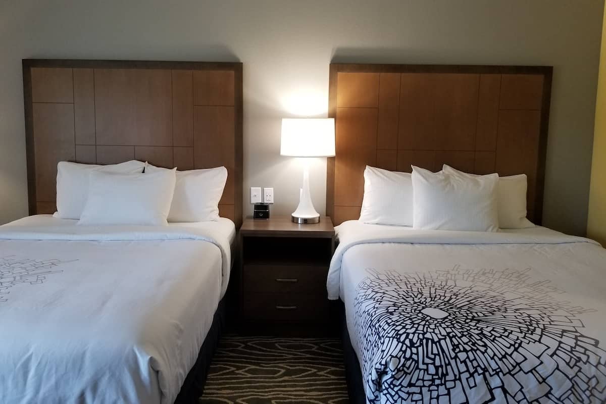 desk, laptop workspace, blackout curtains, iron/ironing board