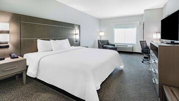 Room, 1 King Bed, Non Smoking | Hypo-allergenic bedding, desk, laptop workspace, blackout drapes