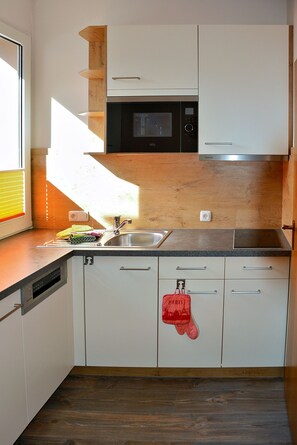 Fridge, microwave, high chair