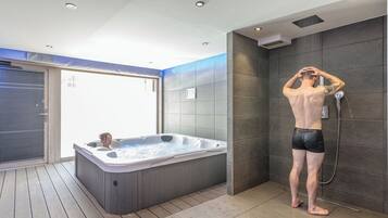 Sauna, bain Ă  remous