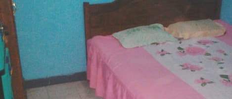 Laptop workspace, bed sheets