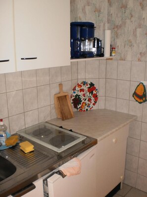 Fridge, coffee/tea maker, cookware/dishes/utensils
