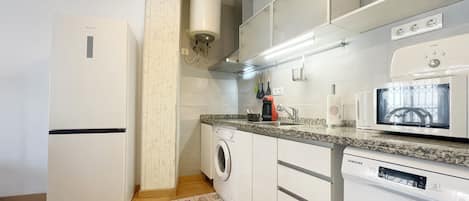 Fridge, microwave, coffee/tea maker, electric kettle