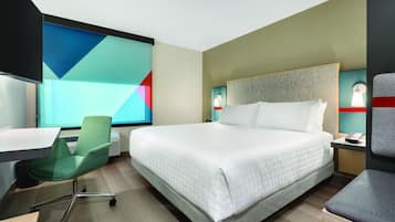 Desk, laptop workspace, blackout drapes, iron/ironing board