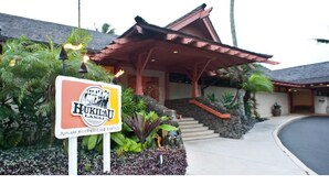 A building with a sign reading "Hukilao Lanai" and a covered entrance. - One Bedroom Garden View Kauai Coast Available 12/23-12/30/2025 (Kapaa)
