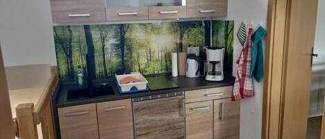 Fridge, microwave, coffee/tea maker, toaster