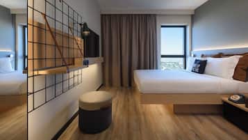 In-room safe, desk, laptop workspace, bed sheets