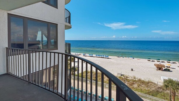 A balcony with a view of a beach and ocean. - Watercrest by iTrip Panama City Beach (Panama City Beach)