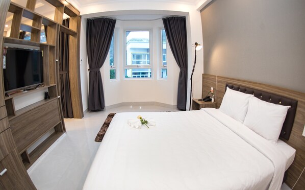 Căn hộ dành cho gia đình | Bộ đồ giường cao cấp, nệm có lớp đệm bông, két bảo mật tại phòng 