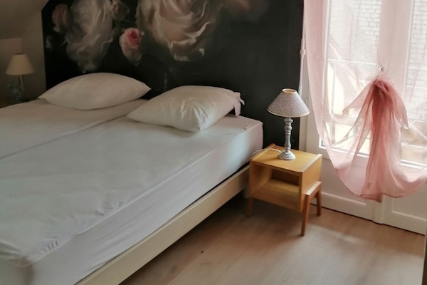 4 slaapkamers, een strijkplank/strijkijzer, gratis wifi, beddengoed