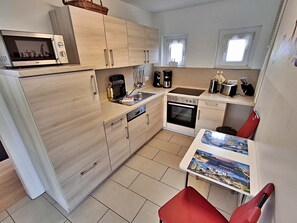 Refrigerador, microondas, horno y lavavajillas 