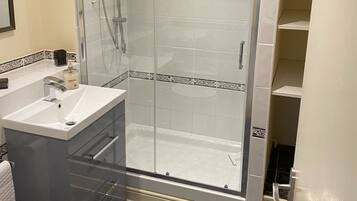 Bathtub, hair dryer, towels