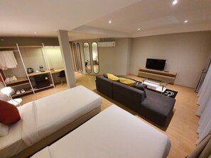 Habitación superior | Minibar, decoración personalizada, muebles diferentes y escritorio 