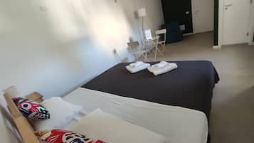 Down comforters, in-room safe, free cribs/infant beds, free WiFi