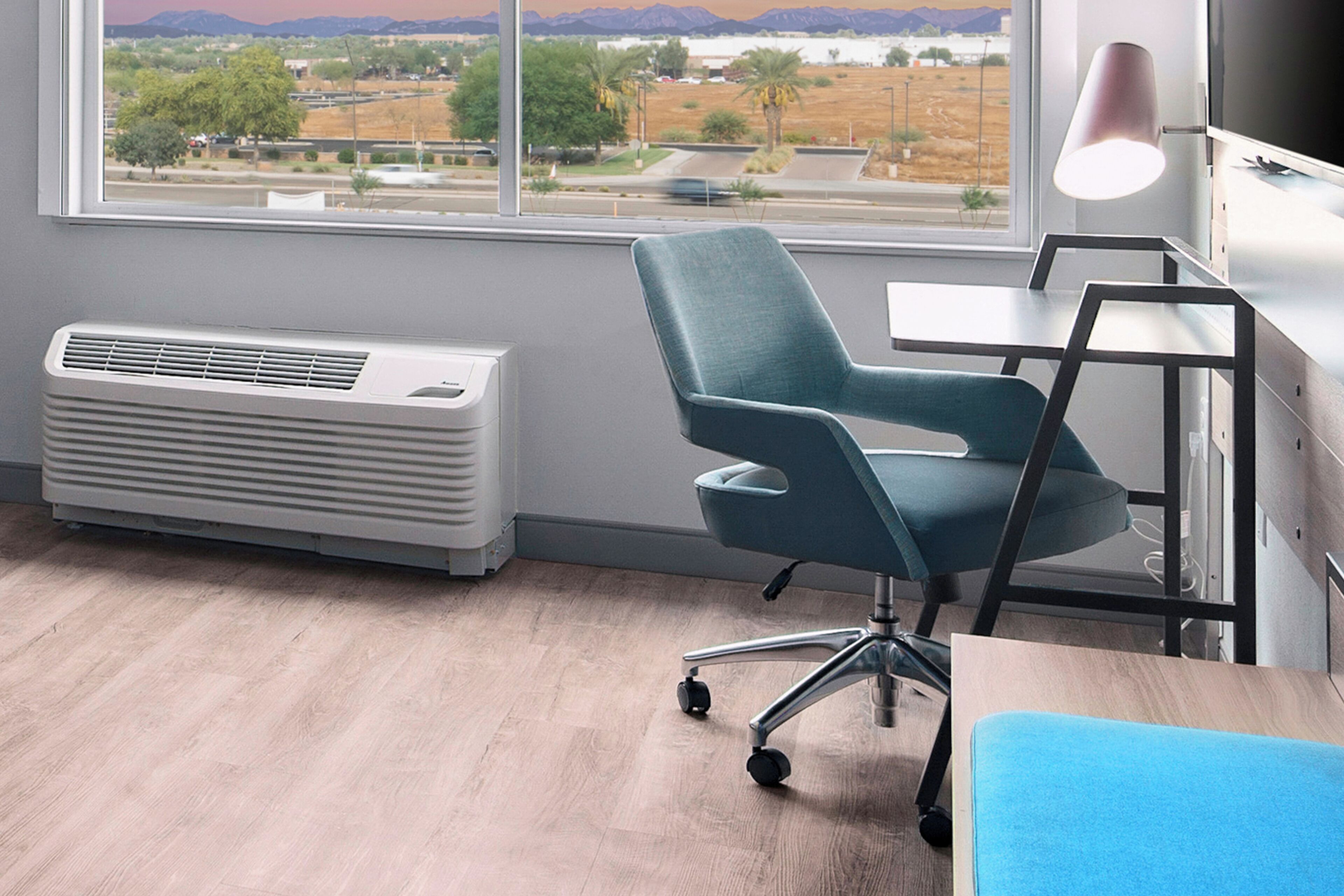 premium bedding, pillow-top beds, desk, laptop workspace