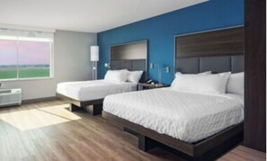 Ropa de cama de alta calidad, camas con pillow-top y escritorio 