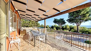 Outdoor dining - Sea view pool villa w/ garden, 2km from sand (Torre Pali)