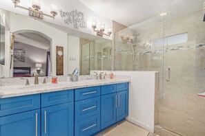 Combined shower/tub, hair dryer, towels, soap