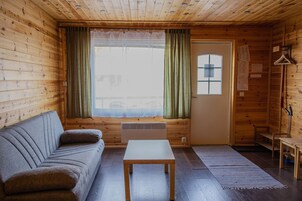 Apartamento | Sala de estar | Una televisión de pantalla plana
