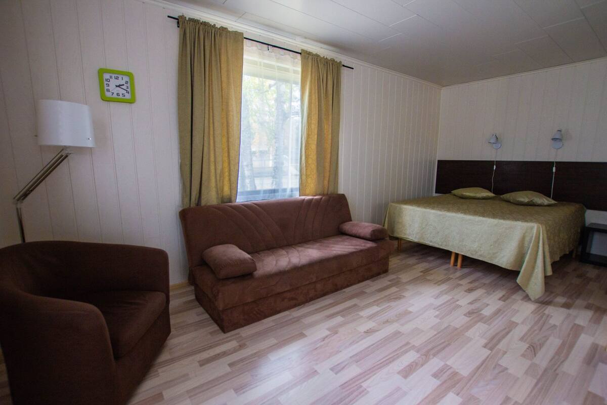 Deluxe Double Room (with Extra Bed) | Living room | Flat-screen TV