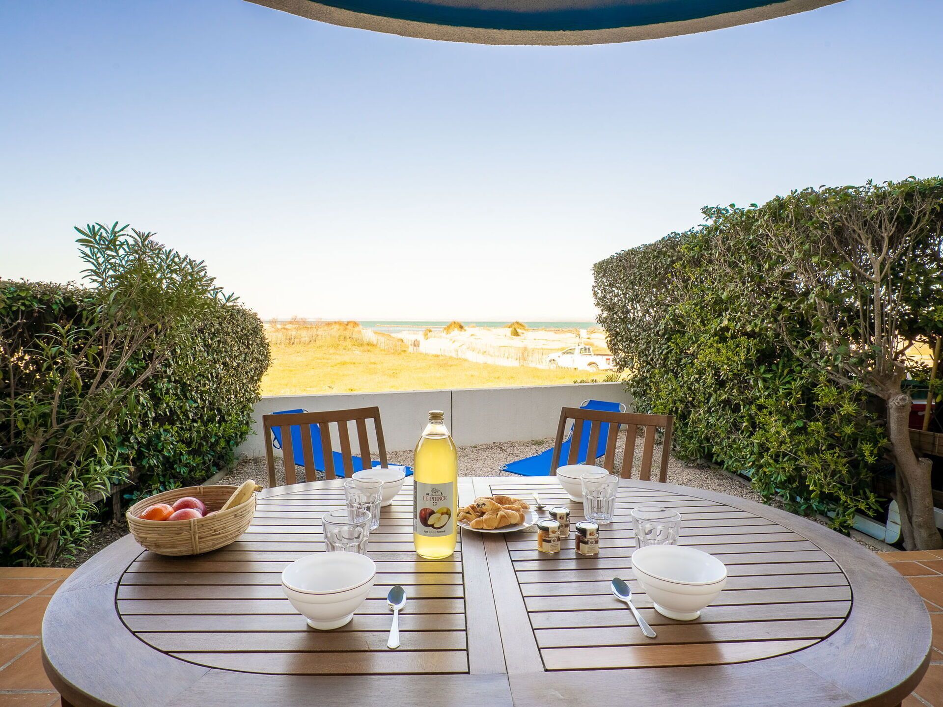 Table, Tableware, Sky, Furniture, Property, Chair, Azure, Nature, Outdoor Table, Plant