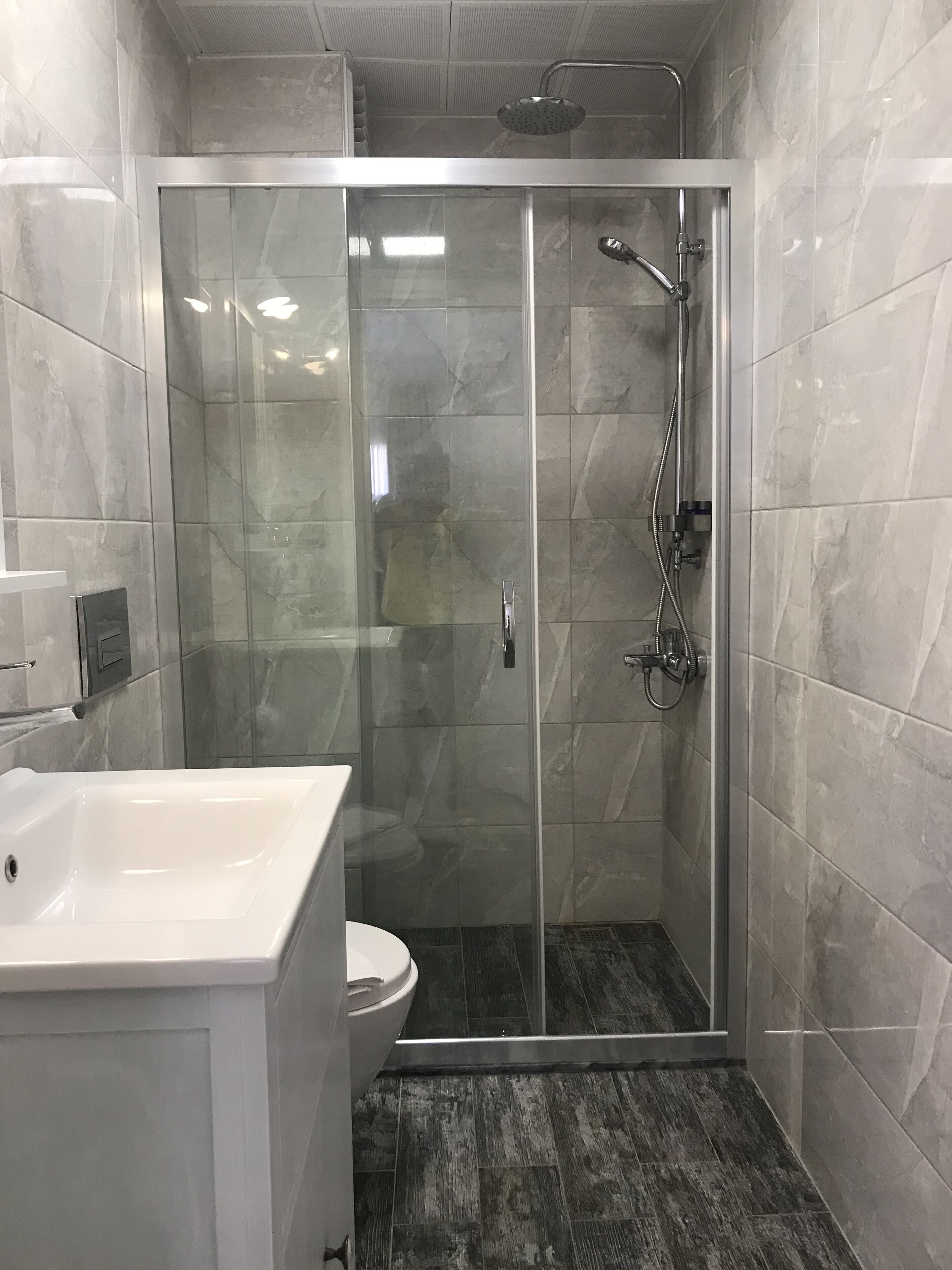 bathtub, slippers, towels