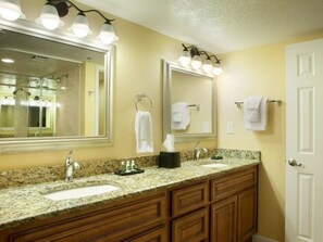 Bathtub, hair dryer, towels, soap