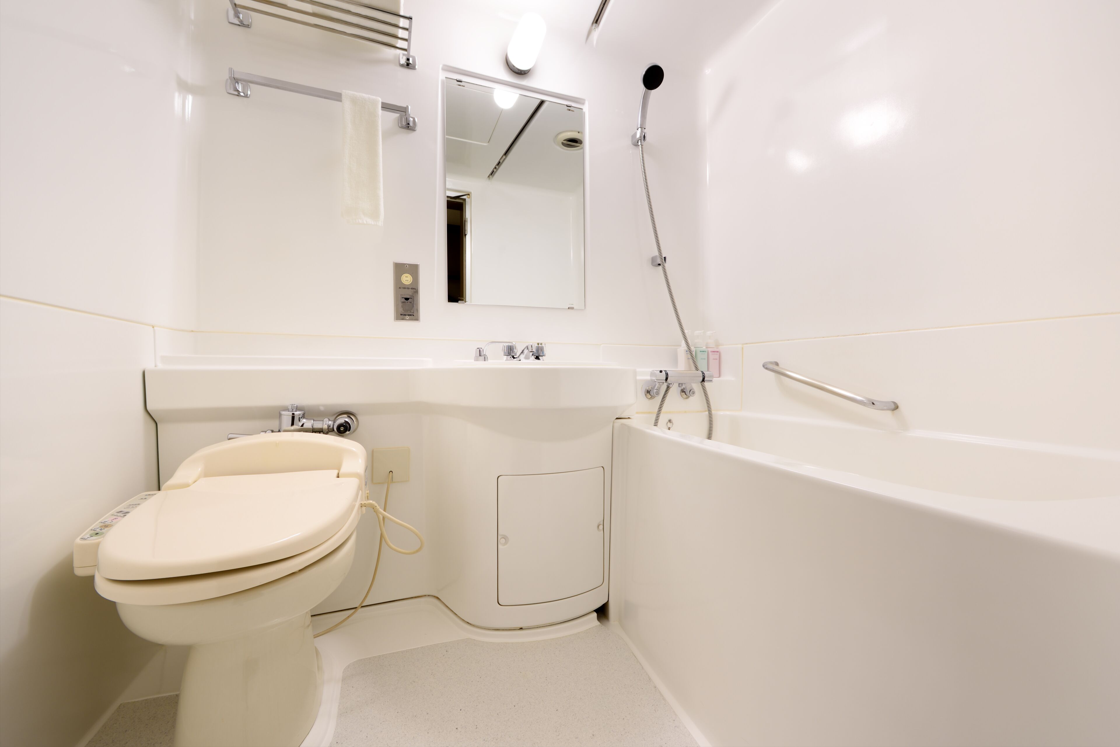 combined shower/bathtub, free toiletries, hair dryer, dressing gowns