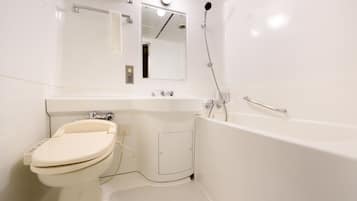 A bathroom with a toilet, sink, and bathtub.