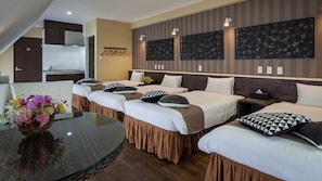 Chambre quadruple | Ameublement unique, bureau, accès au Wi-Fi (inclus), literie fournie