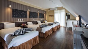 A hotel room with three beds, a small kitchenette, and a large window with curtains. - RozzZ STAY (RozzZ STAY Naha Asahibashi Ekimae) (Naha)