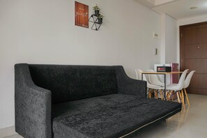 Quarto | Área de estar | TV