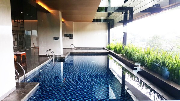 Outdoor pool - Minimalist and Posh Studio Kemang Village Apartment (Jakarta)